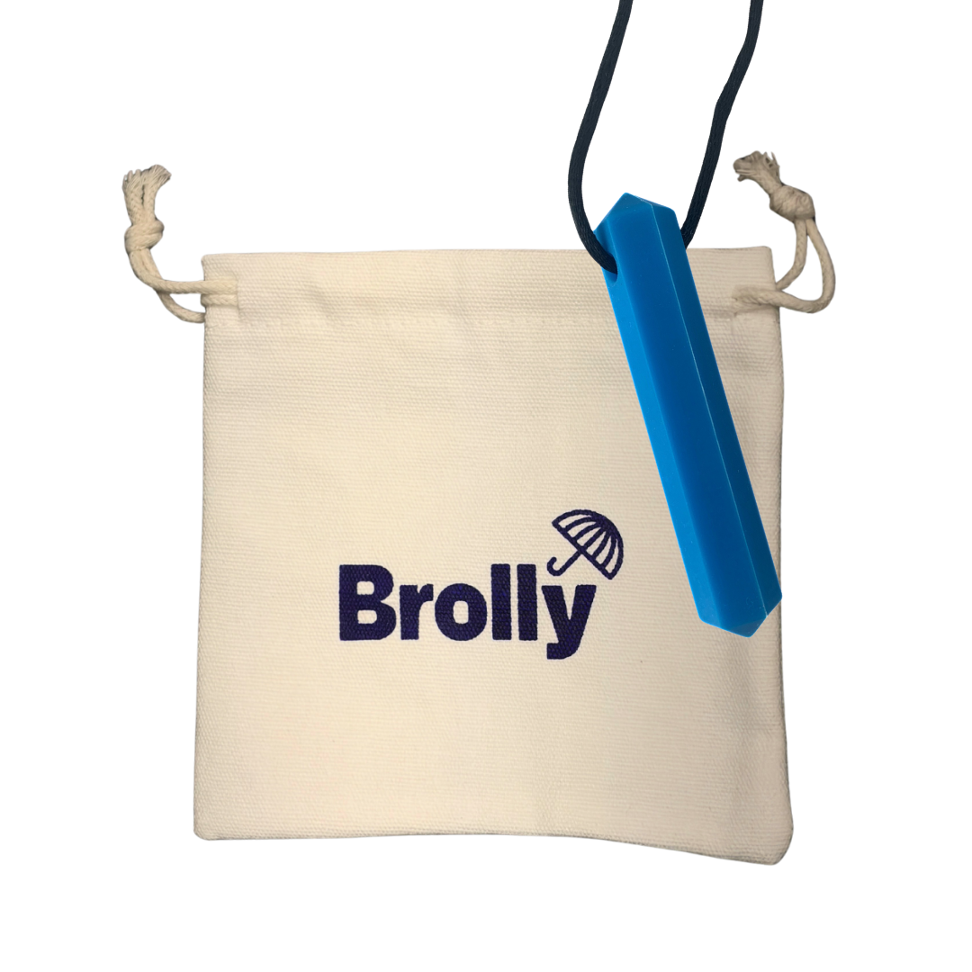 Beige drawstring pouch and Gem-shaped Brolly Chew Necklace on a black cord against a white background - Blue