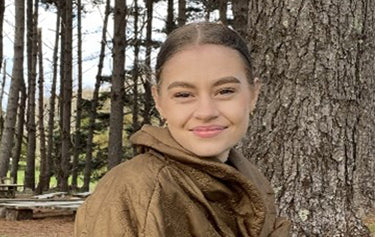 Beautiful disable women smile in brown jacket
