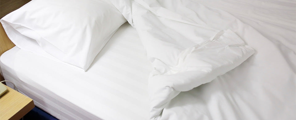 white waterproof extra bed sheet