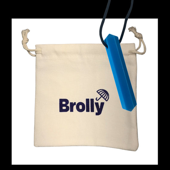 Beige drawstring pouch and Shark Tooth-shaped Brolly Chew Necklace on a black cord against a white background - Blue