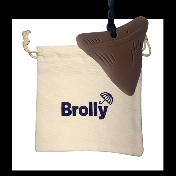 Beige drawstring pouch and Shark Tooth-shaped Brolly Chew Necklace on a black cord against a white background - Blue