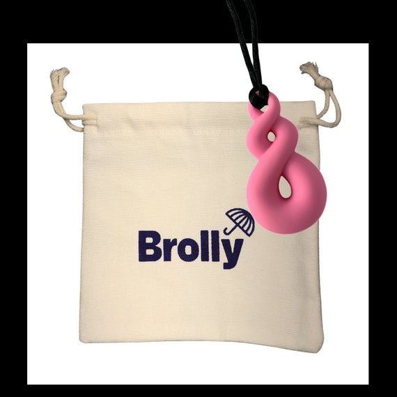 Beige drawstring pouch and Shark Tooth-shaped Brolly Chew Necklace on a black cord against a white background - Blue